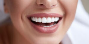 closeup of woman's mouth, smiling